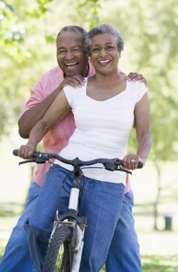 Happy old age couple in cycle