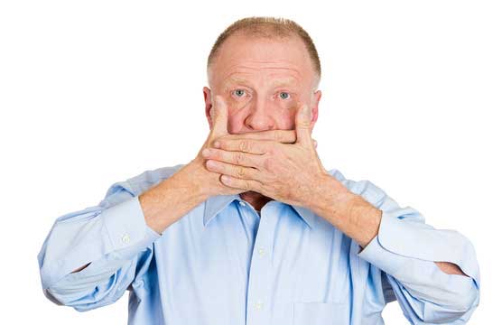 Senior man covering his mouth